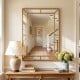 Gold wall mirror with beaded frame, 36 x 24 inches, perfect for living room or entryway decor.