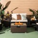 Brown 32x20 inch propane rattan fire pit table set with side table, featuring 40000 BTU heat for outdoor gatherings.