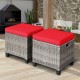 Set of 2 patio rattan wicker ottomans with red removable cushions, perfect for outdoor use in garden or poolside.