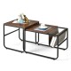 Nesting coffee tables in rustic brown with side pocket for storage, perfect for small living room or bedroom spaces.