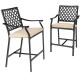 Two patio bar stools with armrests and cushions, featuring a sturdy steel frame, ideal for outdoor seating.
