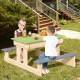 Kids enjoying a 3-in-1 outdoor wooden picnic table with detachable sand and water boxes, perfect for backyard play.