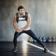 30 LBS adjustable workout weighted vest in use, featuring breathable materials and reflective strips for safety during.