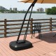 Patio cantilever umbrella base with wheels, made of durable materials, designed for stability in outdoor settings.