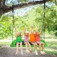 Four children joyfully playing on a 60-inch green platform tree swing, perfect for outdoor fun and relaxation.