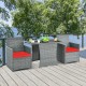 3-piece patio rattan furniture set with cushioned armrests and red cushions, perfect for outdoor dining and relaxation.