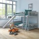 Twin over twin gray wooden bunk bed with slide, featuring safety guardrails and a sturdy ladder for kids' fun and.