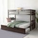 Twin pull-out bunk bed in dark brown, showcasing the trundle and detachable design for versatile sleeping arrangements.