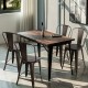Set of four industrial metal dining chairs with elmwood seats, showcasing a modern vintage design for versatile use.