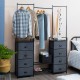 Multifunctional dresser with hanging rods and 8 fabric drawers, perfect for storing clothes and accessories in style.