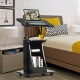 Height adjustable black laptop desk cart with storage, tiltable surface, and wheels for easy mobility in any room.