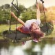 Adjustable army green saucer tree swing for kids, featuring a spacious platform and foam handles for safety and comfort.