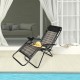 Folding rattan zero gravity lounge chair in gray with removable head pillow, perfect for outdoor relaxation by the pool.