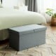 Light gray folding storage ottoman with lift top, sturdy MDF construction, and spacious interior for blankets and shoes.