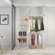 Telescopic clothes hanger rack with shoe storage and adjustable shelves, ideal for organizing limited spaces.
