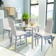 5-piece dining set featuring a clear glass table and four white PVC leather chairs, perfect for modern dining spaces.