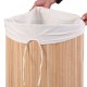 Bamboo laundry hamper with a removable liner and PU leather handles for easy transport and odor control.