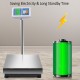 Digital floor platform scale displaying weight readings, featuring a stainless steel platform and long standby time.