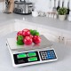 Electronic price computing scale with LCD display, featuring fruits, ideal for supermarkets and markets.