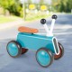 Baby balance bike in blue with non-slip handlebars and 4 stable wheels, designed for kids 10-24 months to promote.