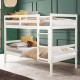 White twin bunk bed made of solid hardwood with guardrails and wide ladder, perfect for space-saving in children's.
