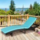 Turquoise cushion on a folding rattan chaise lounge chair, featuring a durable powder-coated steel frame for outdoor.