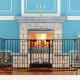 5-panel adjustable black fireplace fence made of heavy-duty steel, ideal for pet safety and versatile indoor use.