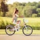 Kids' 18-inch pink bike with adjustable seat, training wheels, and detachable basket for safe and fun riding.