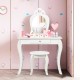 Kids princess makeup dressing table set in white with mirror, large drawer, and detachable top for bedroom or playroom.