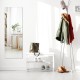 Frameless full-length mirror mounted on the wall, ideal for bedrooms and entryways, featuring a sleek design and clear.