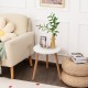 Stylish 16-inch round coffee table with a white MDF top and natural pine wood legs, perfect for accenting any cozy.