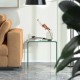 Tempered glass waterfall end table with U-frame, non-slip pads, ideal for living room or office use.