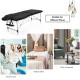Portable adjustable massage bed in black, featuring a sturdy aluminum frame, suitable for spas and salons.