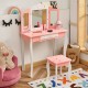 Kids pink vanity table set with tri-folding mirror and drawer, perfect for playtime or study in a child's room.