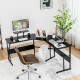 L-shaped black computer desk with monitor stand, flexible configuration, ideal for office or study use.