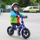 Kids balance bike in blue with adjustable handlebar and seat, featuring puncture-proof tires for safe outdoor riding.