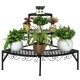Three-tier metal corner plant display rack featuring elegant lace design, perfect for enhancing your patio or living.