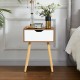 End side storage drawer nightstand with solid wooden legs, featuring a smooth sliding drawer and modern design for.