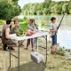 Folding cleaning sink table with sprayer, durable plastic, perfect for outdoor fish cleaning and easy storage.