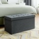 Foldable dark gray fabric storage ottoman with tufted top, spacious interior for blankets and clothes, ideal for.