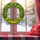48-inch pre-lit cordless artificial Christmas wreath with 200 warm LED lights, perfect for indoor or outdoor holiday.