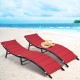 Two red folding patio lounger chairs with premium wicker, perfect for sunbathing by the beach or poolside.
