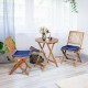 Folding wooden bistro set with cushioned navy chairs and a round table, perfect for outdoor dining and relaxation.