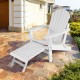 White folding Adirondack chair with pull-out ottoman, made of HDPE, perfect for backyard or poolside relaxation.
