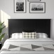 Black flat panel headboard made of sturdy pine wood and plywood, featuring height adjustment for a full-size bed.