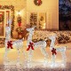 Three lighted Christmas reindeer with festive bows, showcasing a 5 ft buck, 4 ft doe, and 3 ft fawn for holiday cheer.