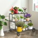 Three-tier outdoor metal garden planter holder shelf in black, showcasing potted plants for stylish home or patio decor.