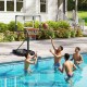 Portable basketball hoop with adjustable height from 3.3 to 10 feet, ideal for poolside summer fun and family play.