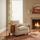Dimmable LED floor lamp with golden pole and three circular rings, perfect for stylish illumination in living rooms.