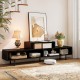 Black 3 cubby TV stand for TVs up to 70 inches, featuring open storage compartments and a stylish design for living.